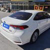Corolla 2021 Hybrid 1.8L E-CVT Elite Edition, Февраль 2022 г., пробег 20700 км. (Б/у) Передний — изображение 2